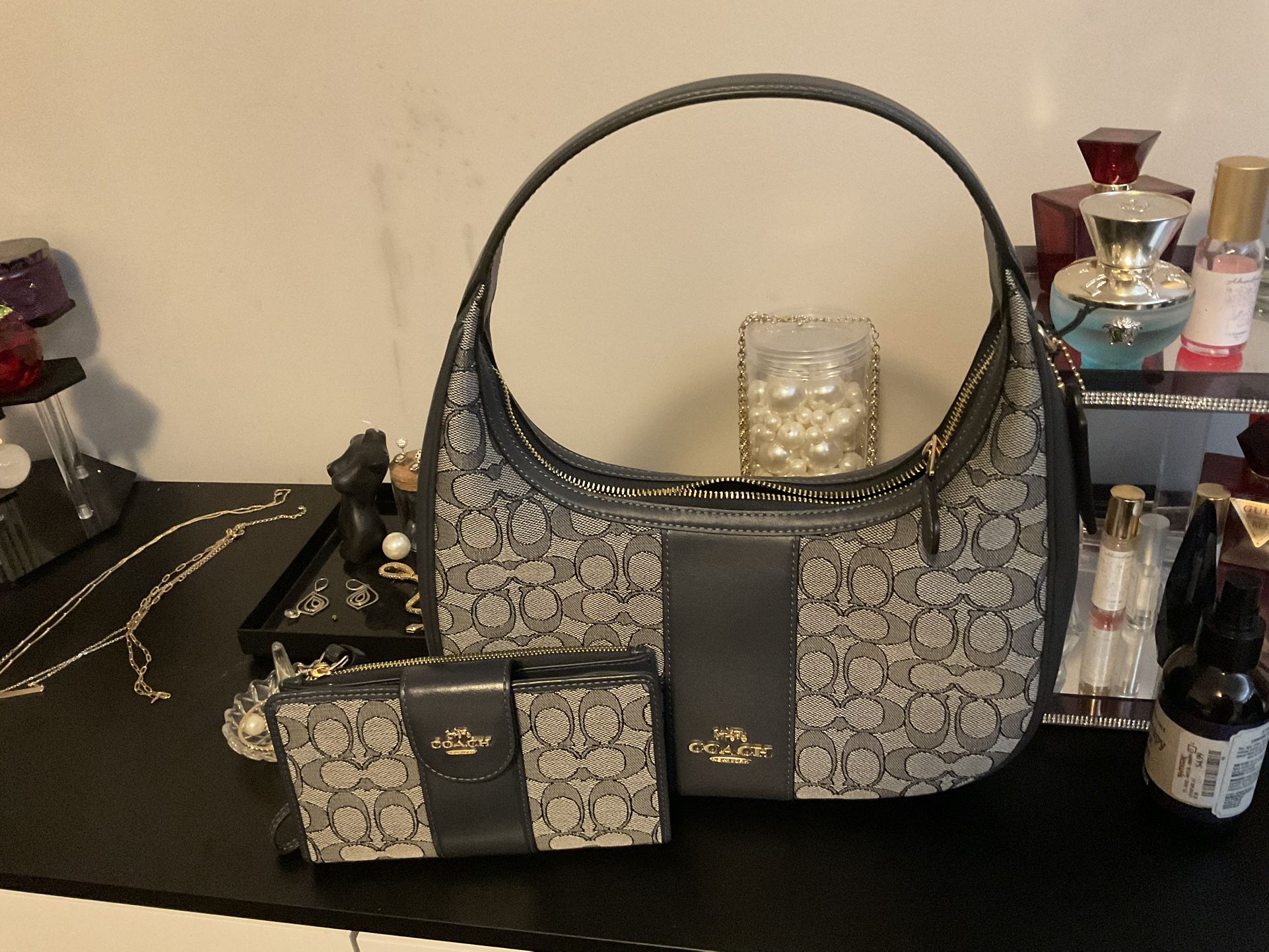 Coach Purse and wristlet set.