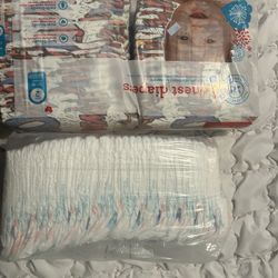 1 pack newborn diapers and Size 2 diapers.