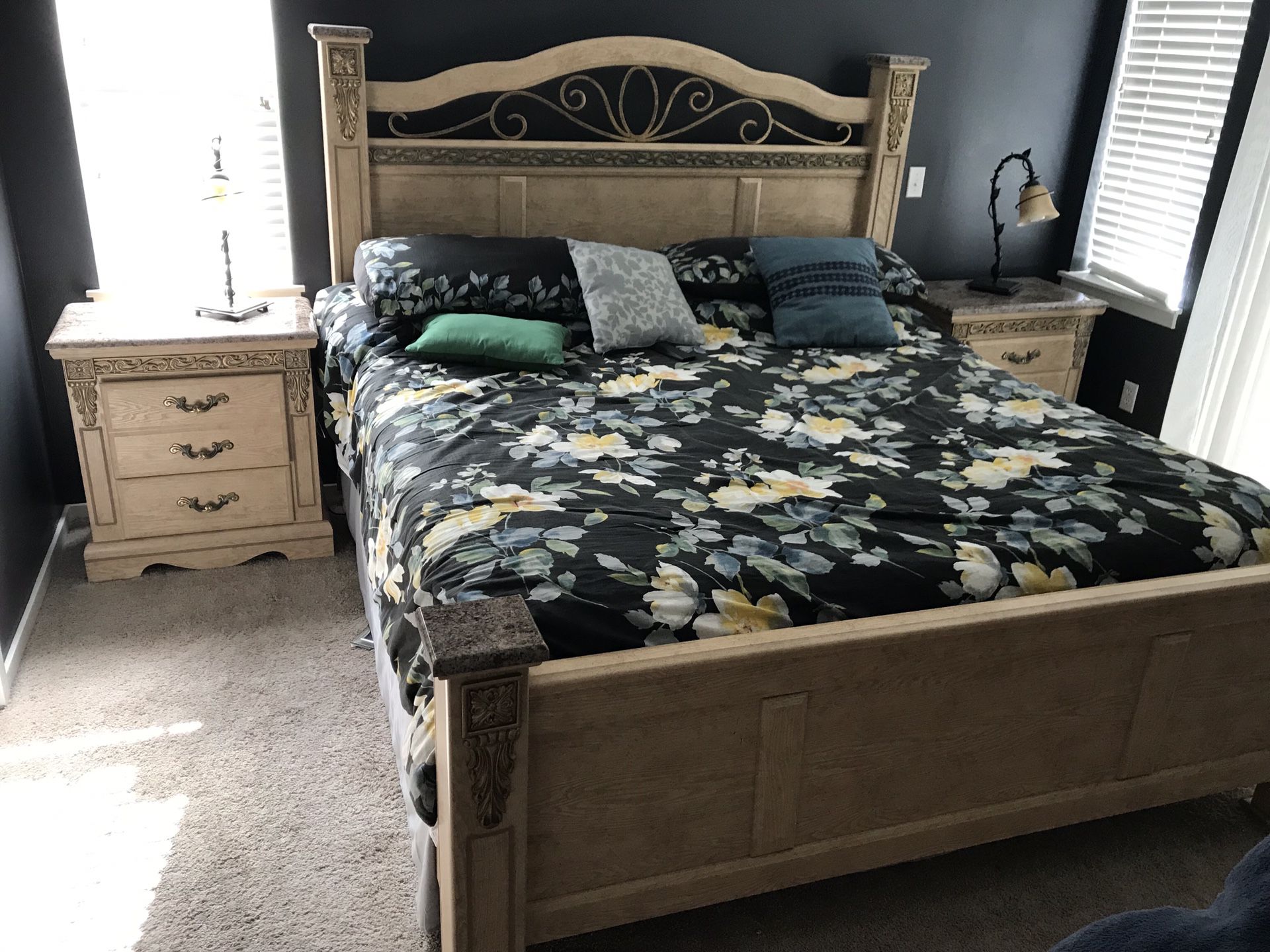 King size bedroom set. Includes head and foot boards, two night tables with lamps and the dresser.