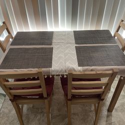 Dinner Table With Four Chairs, Table Cloth, Chair Cushions And Table Mats 
