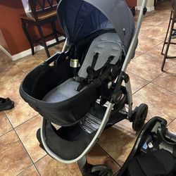 Baby Stroller Graco Pramette Model Light Blue And A Base For A Car Seat 