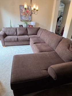 Large dark brown comfy sectional couch