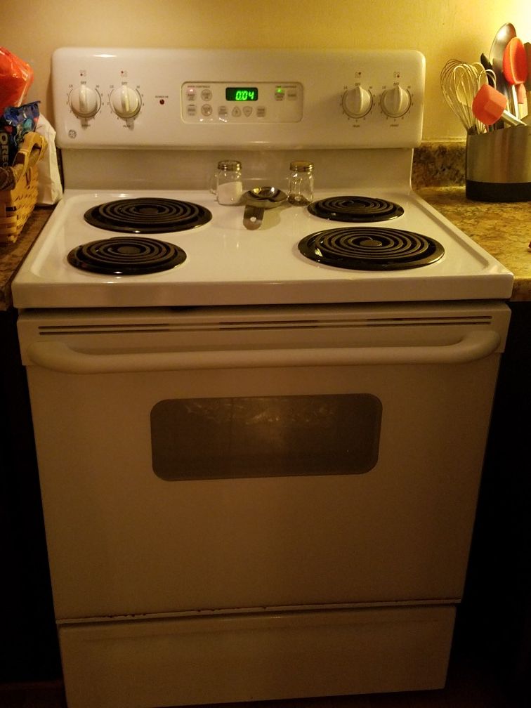 White GE electric range