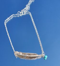 Feather anklet