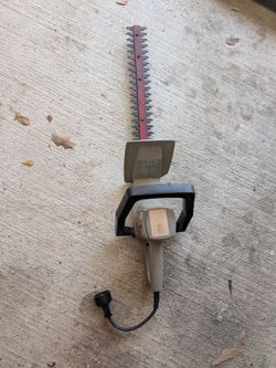 Craftsman 18" electric hedge trimmer in good working condition.