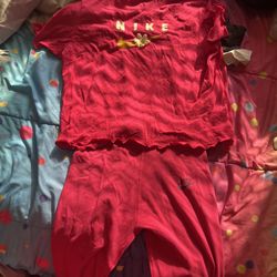 pink nike outfit, size large in little girls 