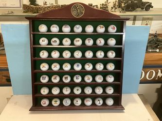 Disney Golf Ball Collection with shelf.