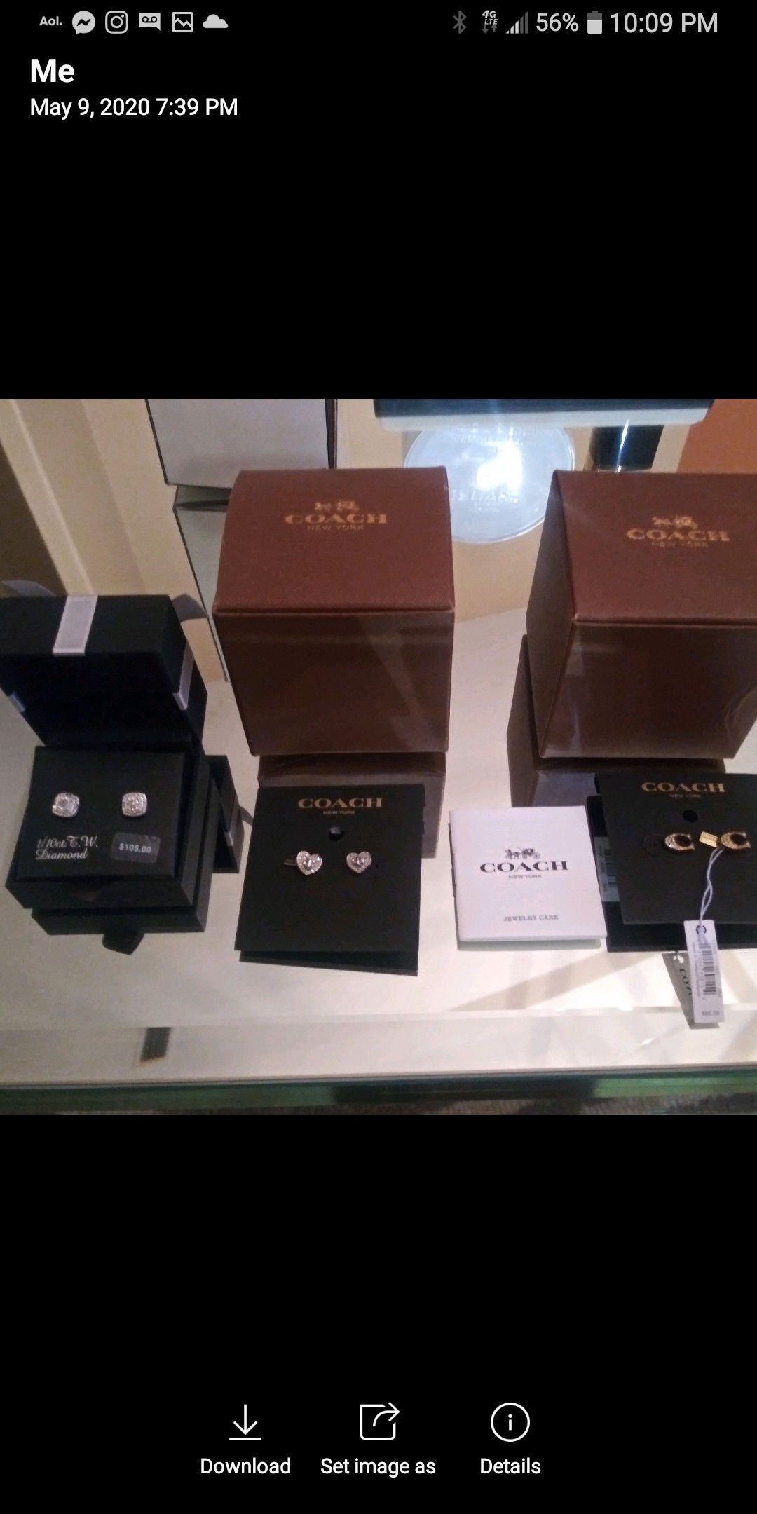 2 Coach earrings and 1 pair of diamond earrings. Brand new with tags! Perfect Mother's Day gift!!