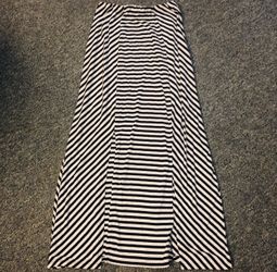 Size 1x black and white striped maxi skirt w/two long slits in the front. Only worn once