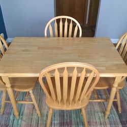 Solid wood farmhouse table with 6 chairs