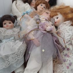8 Porcelain Dolls 
