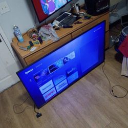 55 inch Samsung Smart TV with stand and remote 