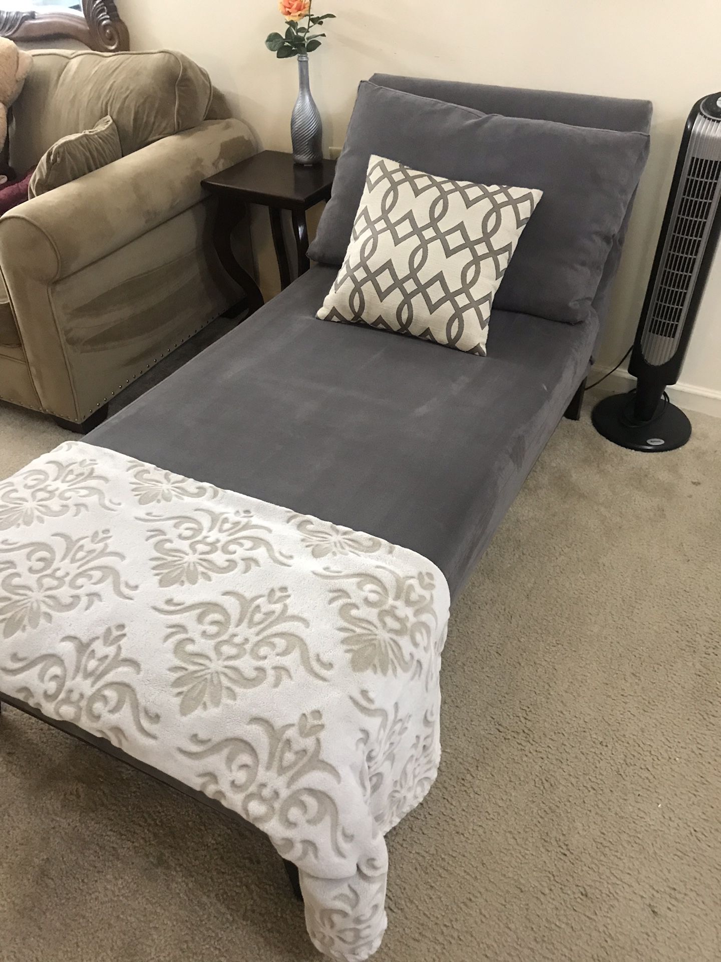Gray chaise lounge chair