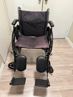 Wheelchair with Elevating Leg Rests