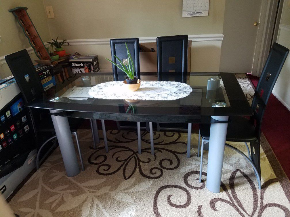 Glass top dining Table with 4 chairs