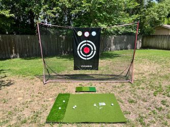 Golf practice net with 2 golf mats for use with different clubs. Including tees