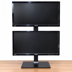 Two ASUS widescreen monitors mounted on a dual stacked monitor stand