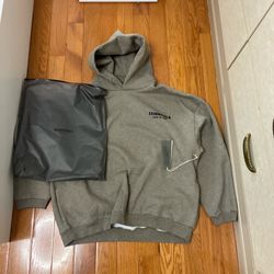 Brand new Fear of god essentals hoodie desert sand oatmeal size large