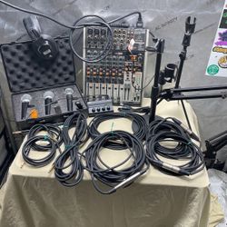 Studio Microphone And Headphone Set Up With Behringer Mix Board