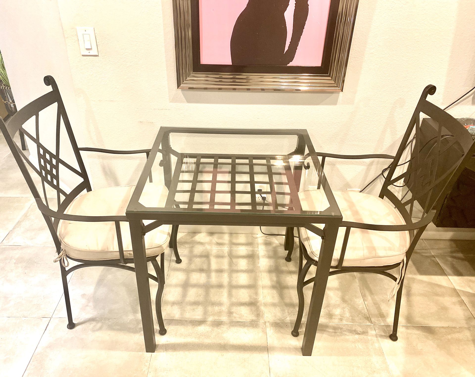 Modern breakfast table set with chairs