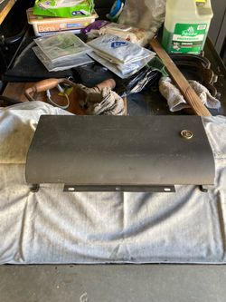 Glove box door off a 1955 Ford Fairlane.