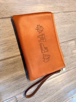 Most Wanted Tan Leather Wristlet Clutch with outdoor theme
