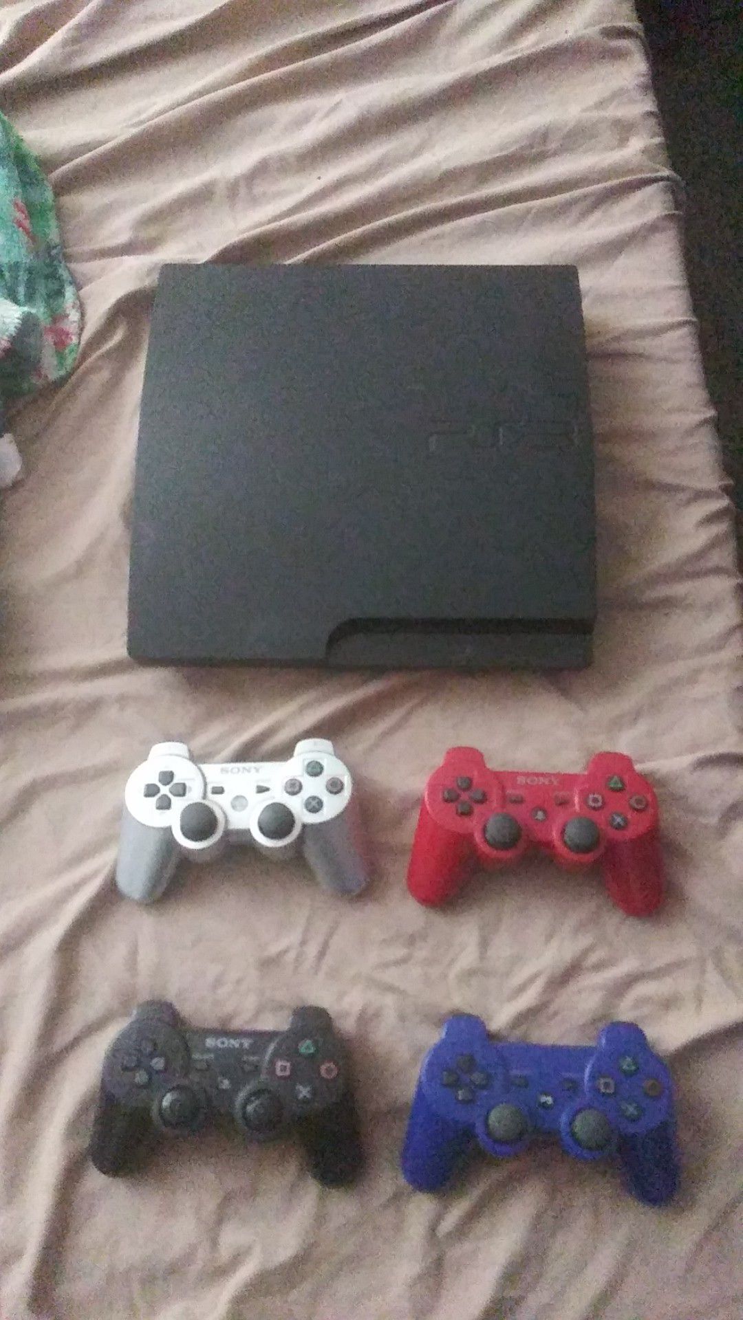 PS3 with 4controllers and 8games