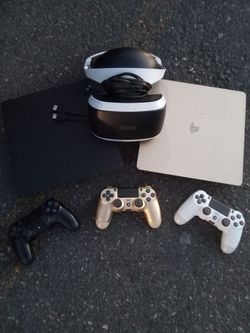 2 PlayStation 4 and PlayStation VR headset with 3 controllers