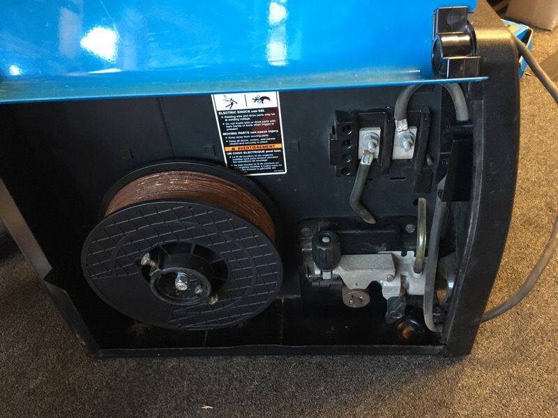 Miller. Millermatic 175 230v wire welder w/new welding gun for Sale in
