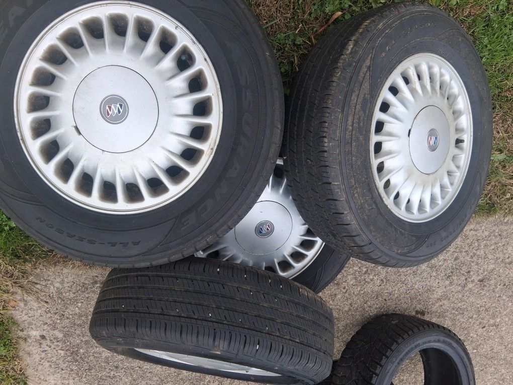 Tires With Rims For Sale Goodyear All Season Radials .two Are Fairly New And Other Two Are Over Half Tread Gone $300 Or Best Offer .205/75/15