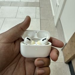 Apple AirPods Pro with charging case. 2022