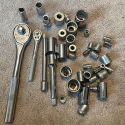 Socket wrenches and sockets