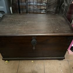 Antique  dark wood storage trunk 