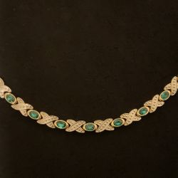 7” Goldtone X0 Bracelet With Emerald Colored Rhinestones 