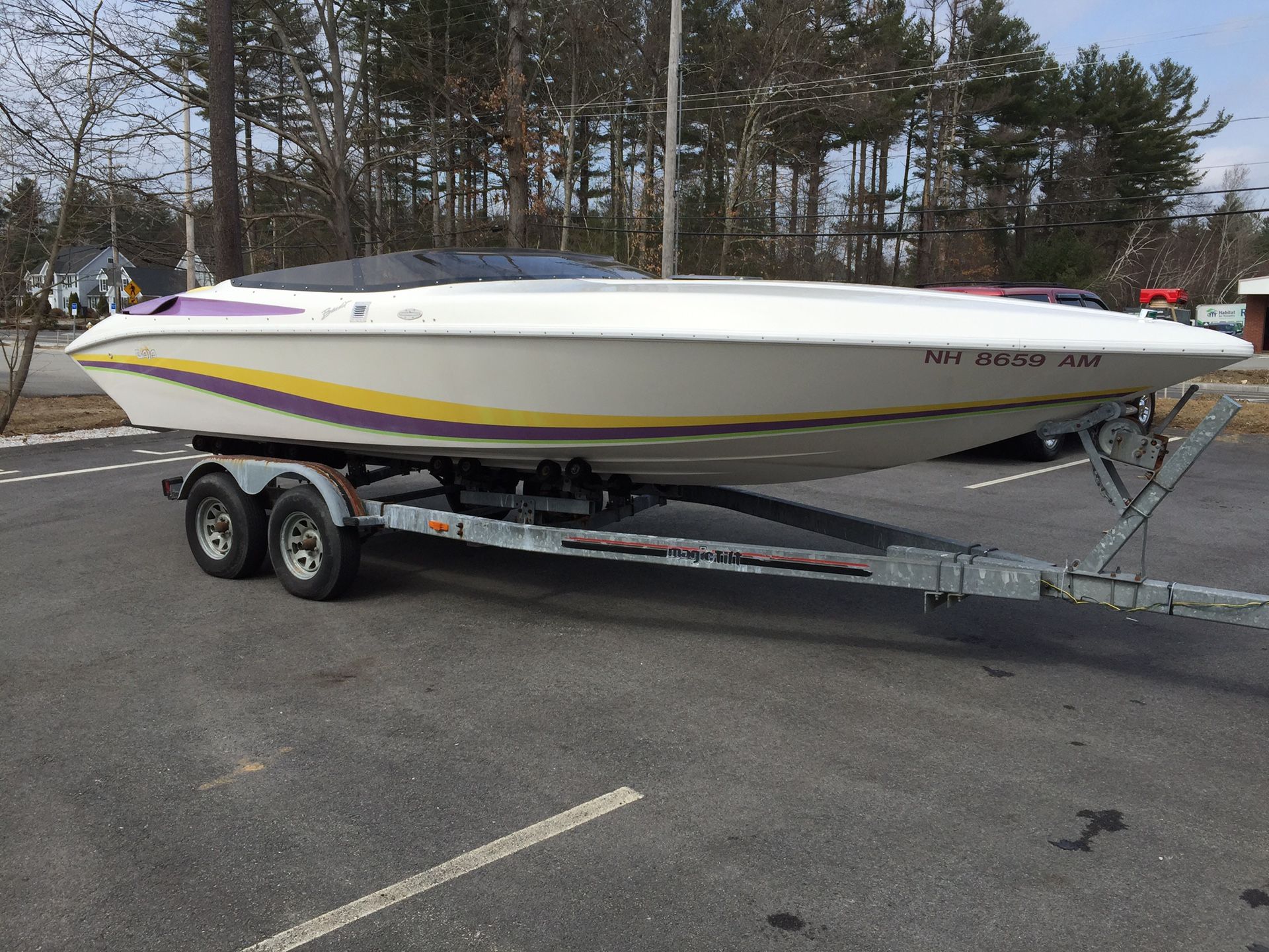 1992 Baja Bandit boat with 2 axel trailer will trade
