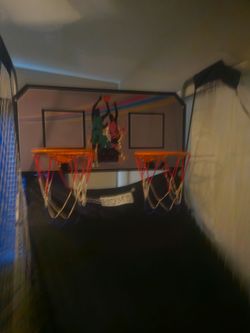 Electronic basketball hoop