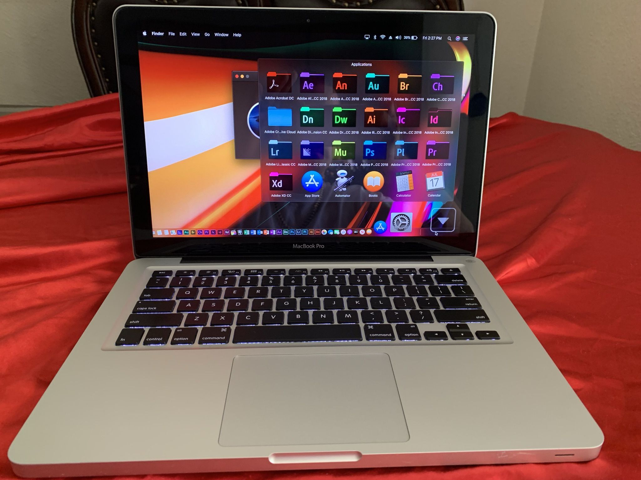 MacBook Pro i5   8 gigs ram   Has Photoshop 