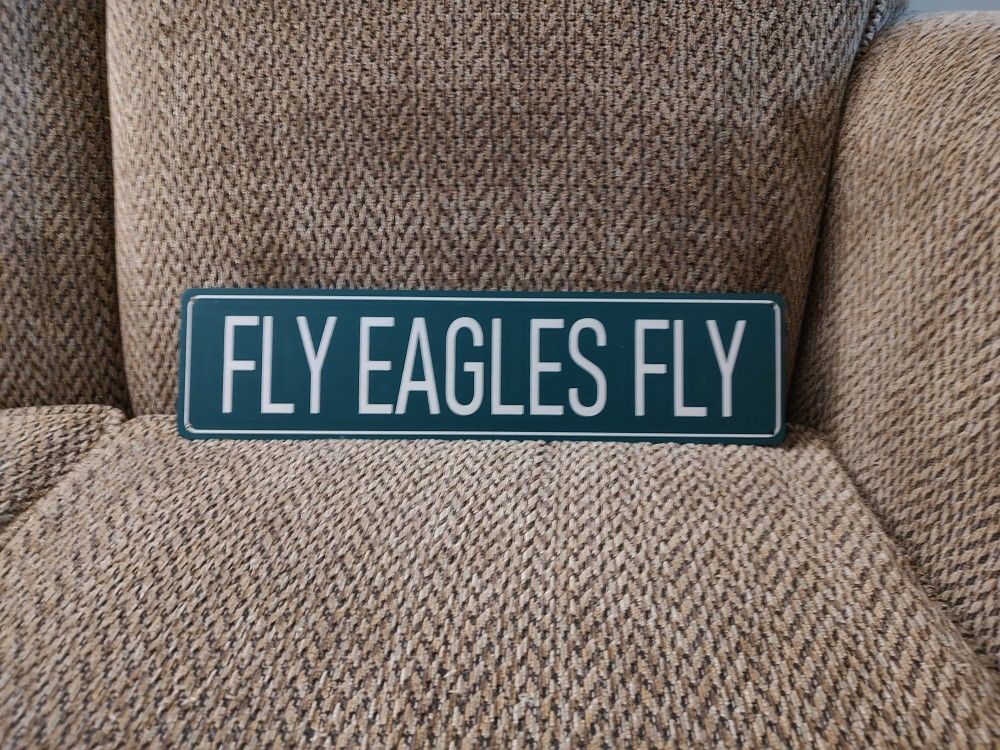 "FLY EAGLES FLY" METAL SIGN. 16" X 4". NEW. PICKUP ONLY.