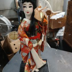 Oriental doll $20 Or  best offered.