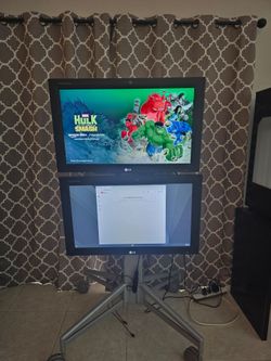 Qty. 2 - 32 Inch LG monitors Model M3203CCBA. With LG Smart Remote.  Portrait Or Landscape Display