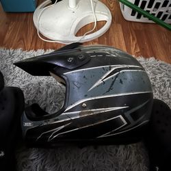 Helmets And A Pair Of Riding Boots