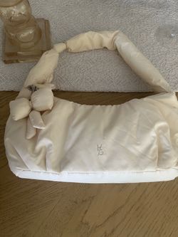 Crescent Puffer shoulder purse Happily Grey brand. Cream color 15” with bow charm detachable