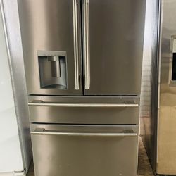 Brand new four-door, stainless steel refrigerator