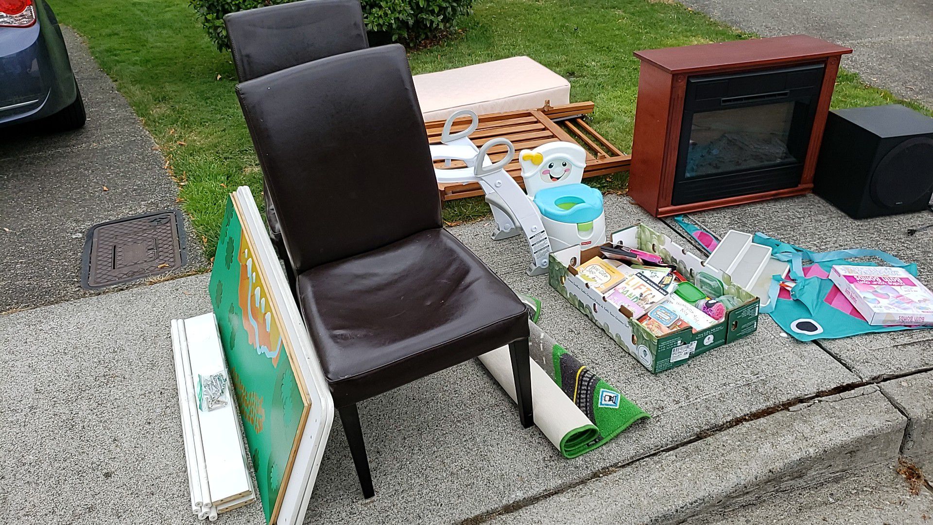 **Free items** crib with mattress, play table, electric fireplace, subwoofer, kids items.