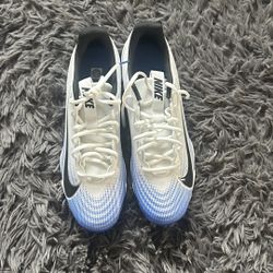Nike white and blue football cleats