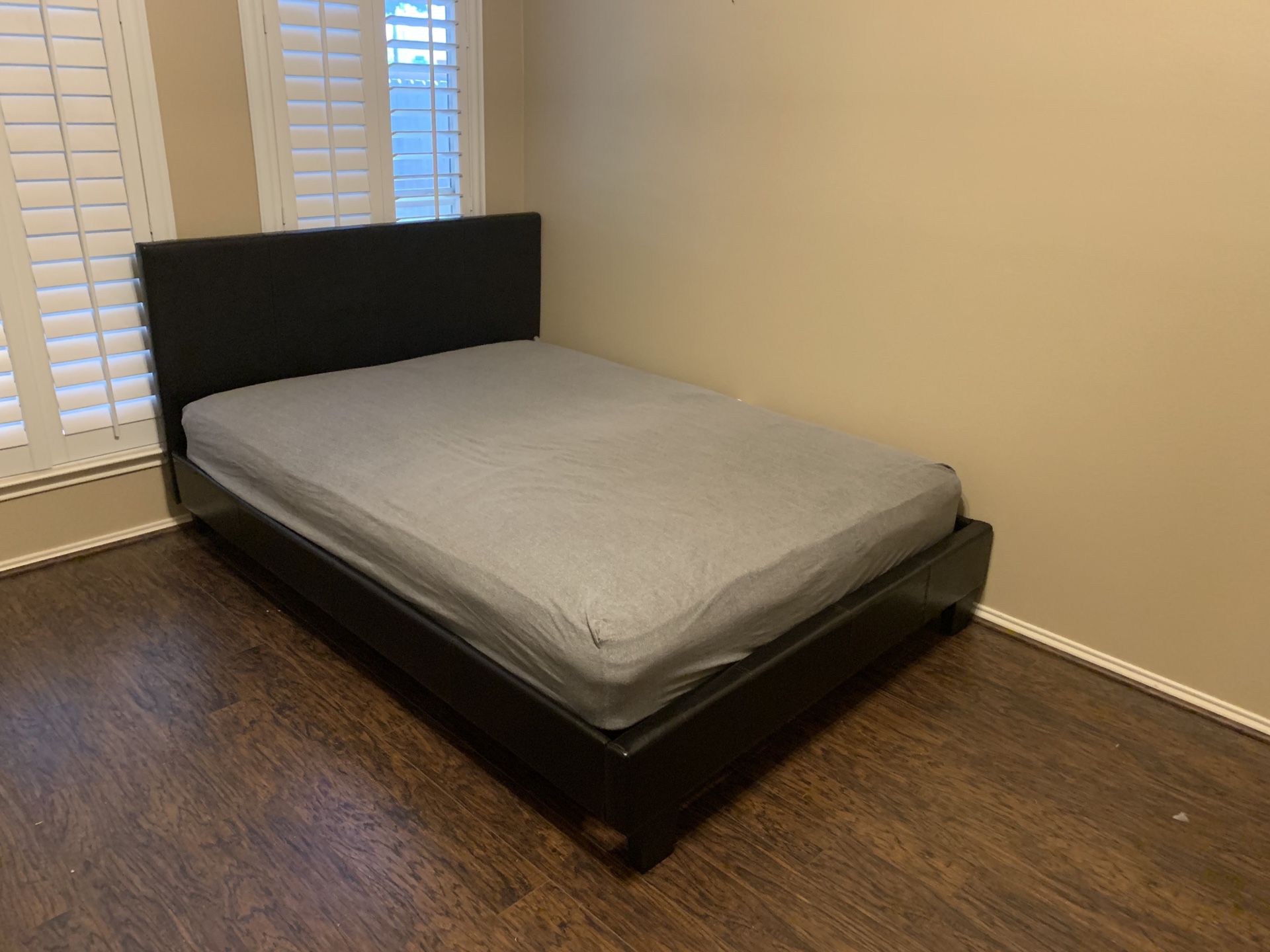 Full size black leather bed with mattress ( free delivery)