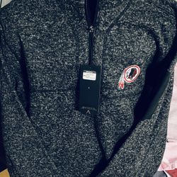 Here’s a NFL Licensed Redskins Light Weight 1/4 Zippered Pull Over Jacket in an Adult Size Large 