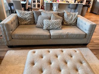 Tufted Sofa with Nailhead Trim and Ottoman by cindycrawford homes