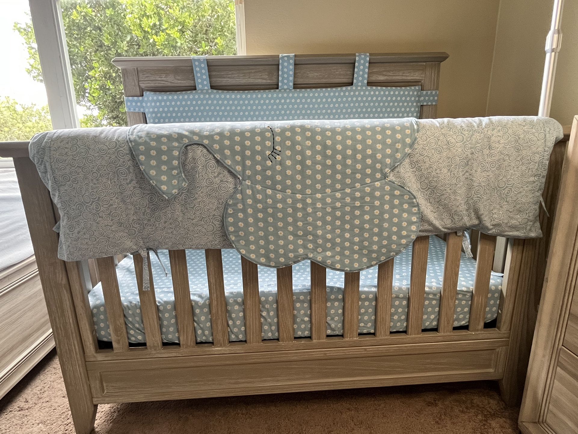 Padded crib wrap sets designed for conversion cribs