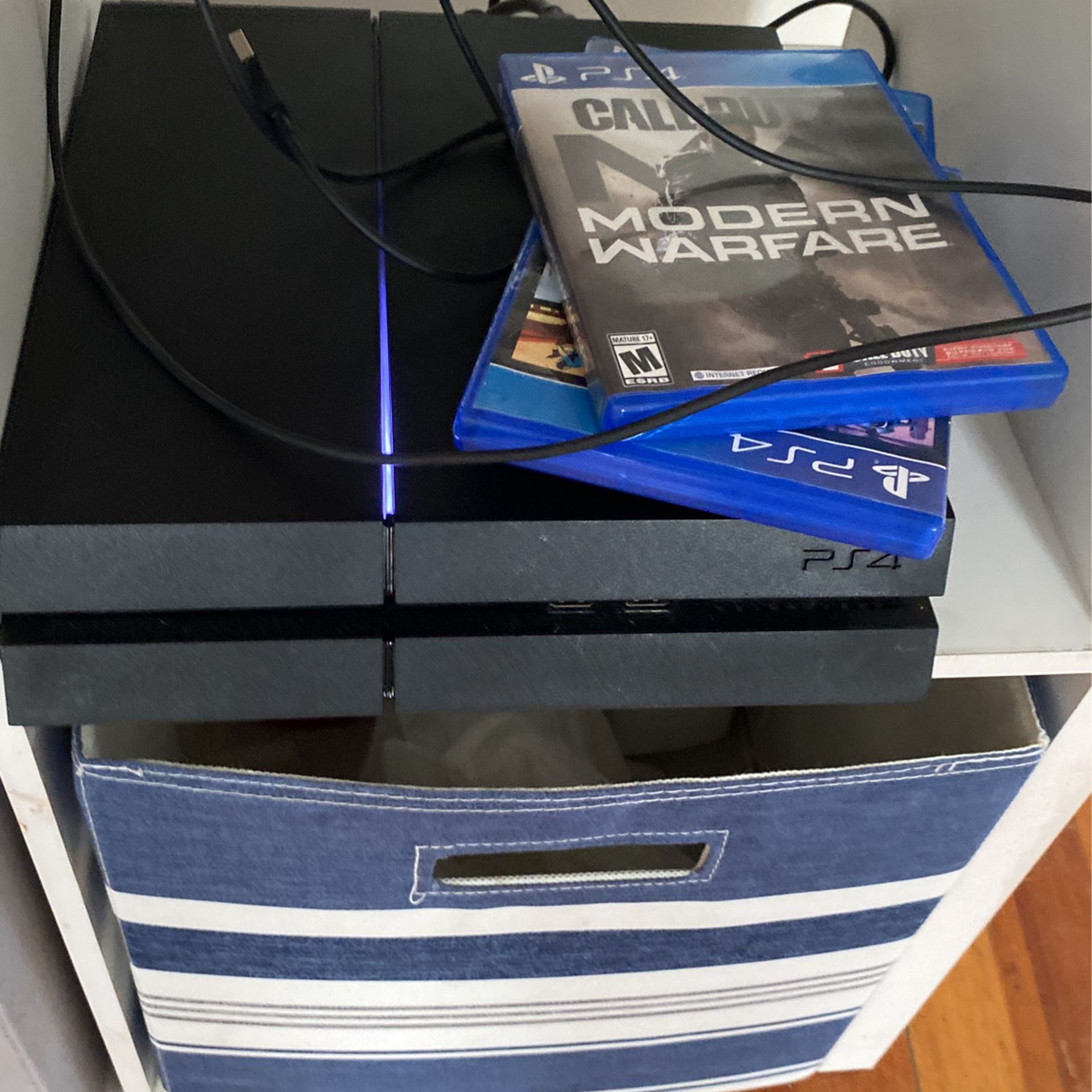 PS4 With Cords And couple games And Controller